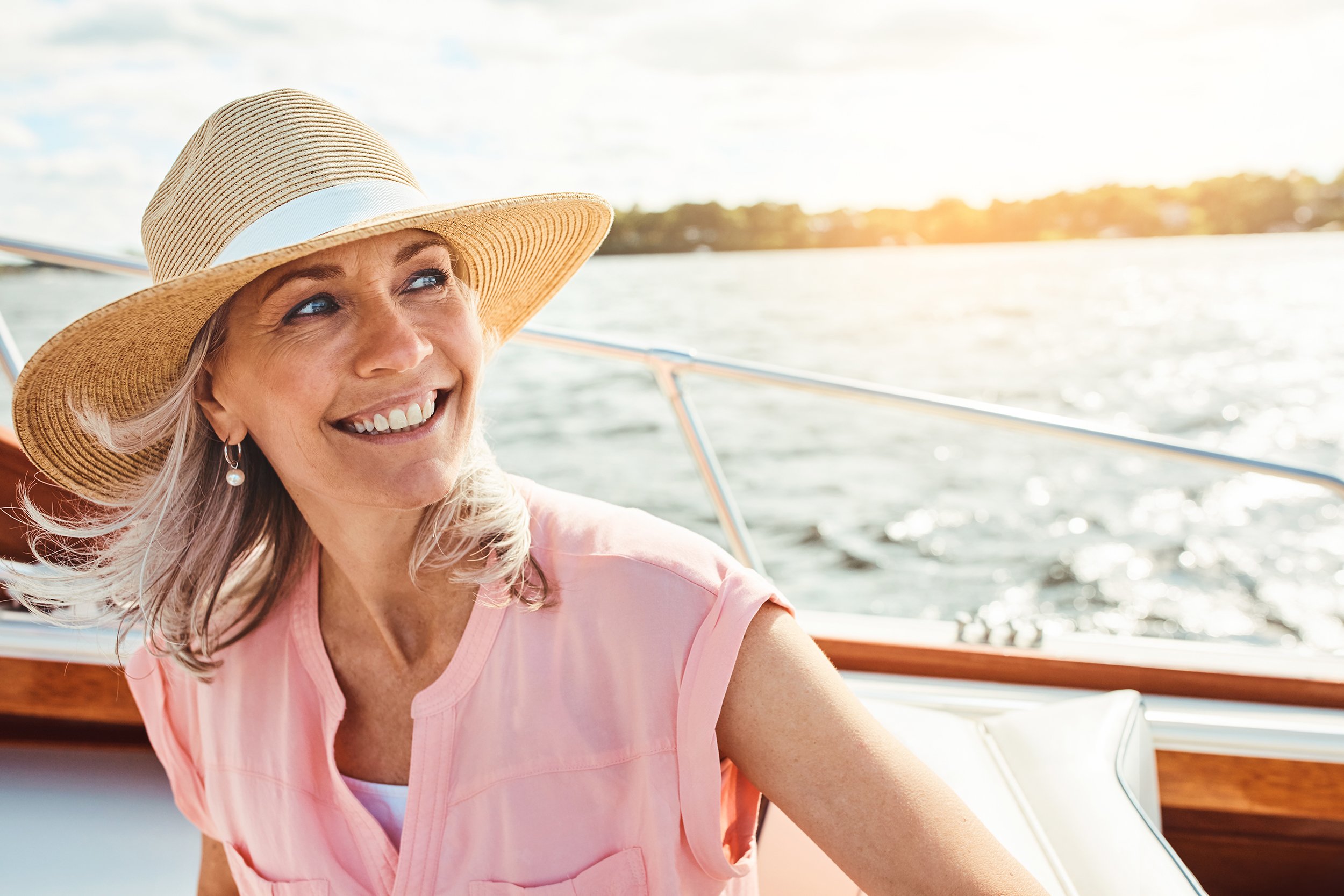 woman on boat free travel insurance header